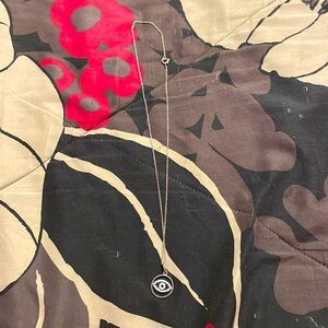 Beautiful evil eye necklace with cubic zirconia.